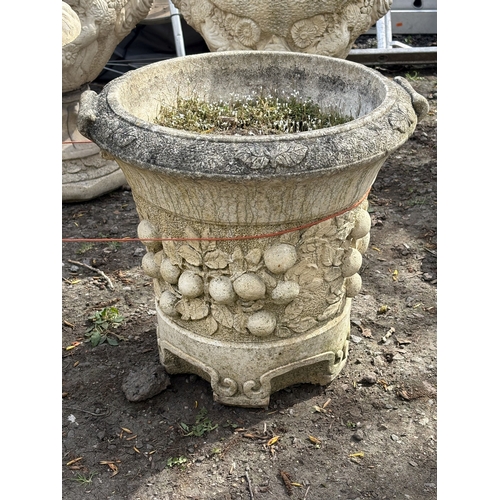 3 - FOUR VARIOUS WEATHERED CONCRETE GARDEN PLANTERS/URNS, to include an urn on a loose stand, diameter 4... 