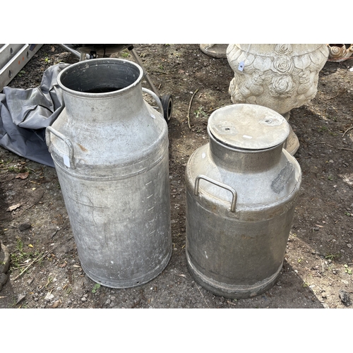 5 - TWO GALVANISED MILK CHURNS, on stamped Nestle, condition report: handle missing on one milk churn, a... 