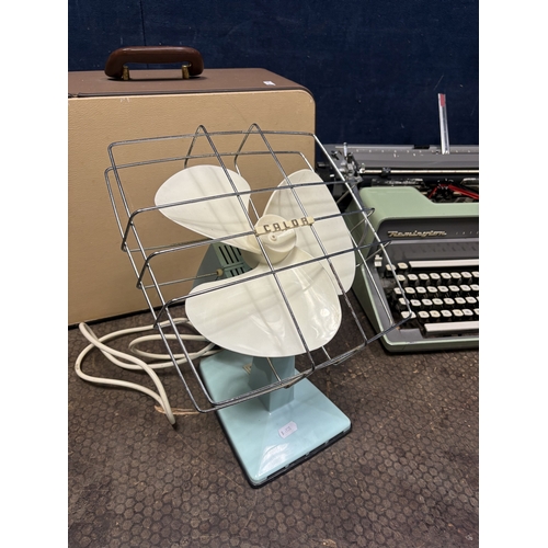 51 - A REMINGTON INTERNATIONAL TYPEWRITER, a sharp PA-3100S electric typewriter, a vintage Calor table fa... 