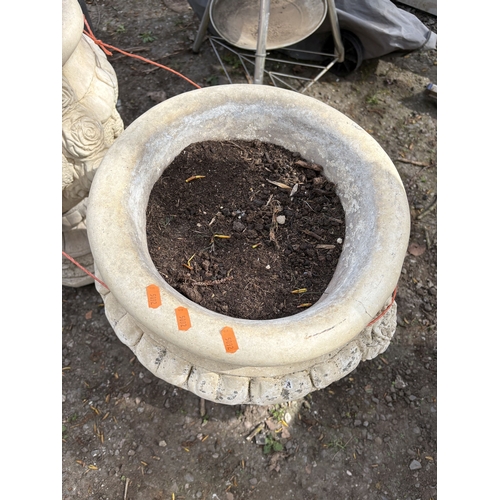 6 - A PAIR OF WEATHERED CONCRETE GARDEN URNS, decorated with roses and fruiting vines, diameter 47cm x h... 