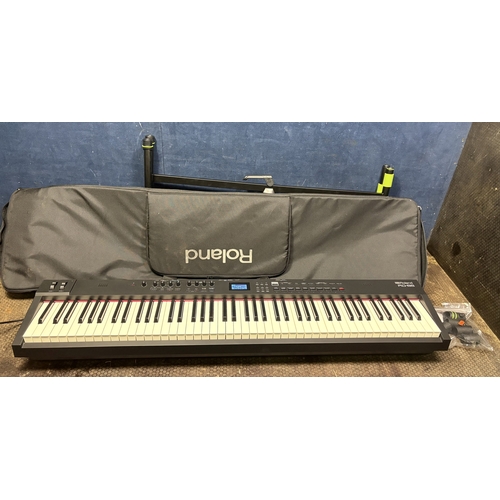 61 - A ROLAND RD-88 STAGE PIANO / SYNTHESIZER, with soft case, Gravity folding stand, folding stool, and ... 