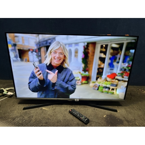 63 - A SAMSUNG UE40J5100AK 40 INCH LCD TV, with remote, condition report: PAT pass and working