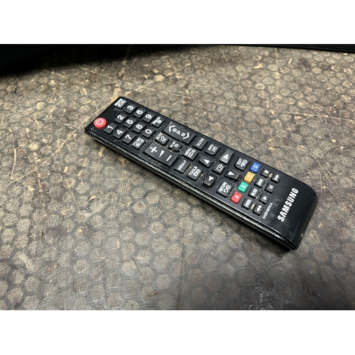63 - A SAMSUNG UE40J5100AK 40 INCH LCD TV, with remote, condition report: PAT pass and working