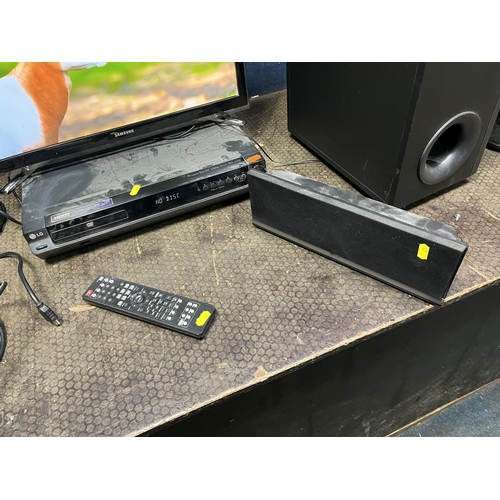 65 - A SAMSUNG UE22H5600 22in SMART TV without a remote and an LG home theatre system, including a DVD pl... 