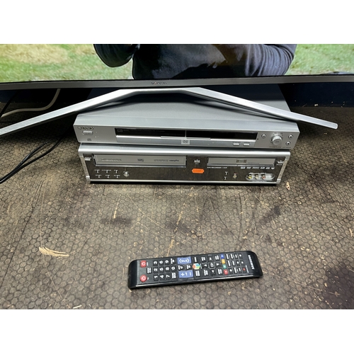 66 - A SAMSUNG UE40KU6400 40in SMART TV with remote (PAT pass and working), a Daewoo VHD/DVD player and a... 