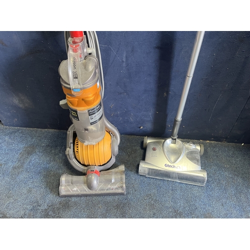 74 - A DYSON DC24 UPRIGHT VACUUM CLEANER (PAT pass and working) and a G Tech cordless vacuum (no charger,... 