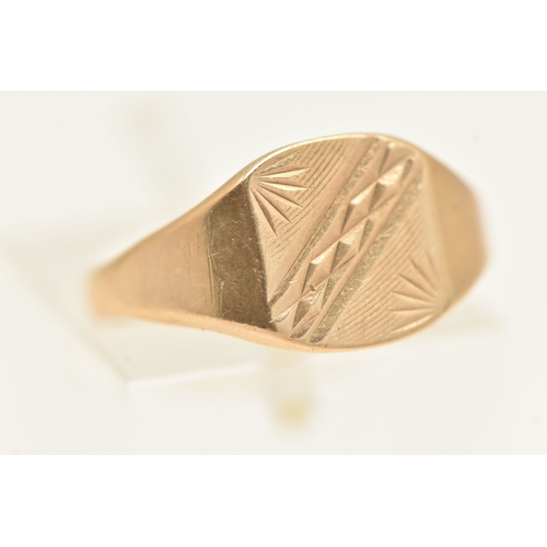 414 - A 9CT YELLOW GOLD SIGNET RING, approximate width 9mm, hallmarked 9ct London, ring size K 1/2, approx... 