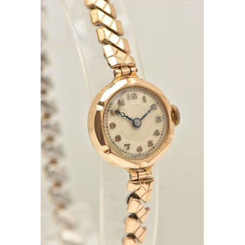 479 - A LADIES BOXED 9CT GOLD CASED WRISTWATCH, manual wind, round silvered Arabic numeral dial, blue stee... 