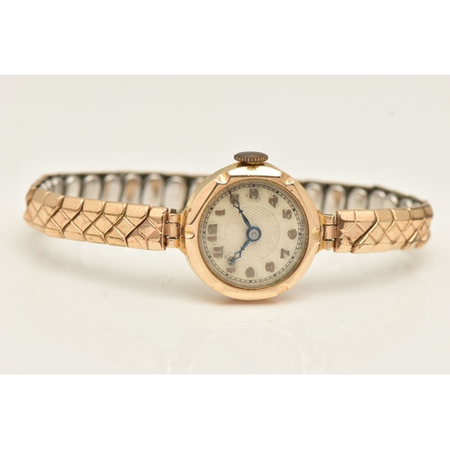 479 - A LADIES BOXED 9CT GOLD CASED WRISTWATCH, manual wind, round silvered Arabic numeral dial, blue stee... 