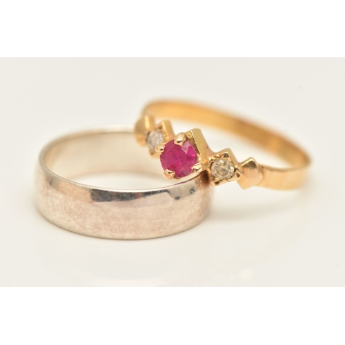 483 - A SMALL ASSORTMENT OF JEWLLERY, to include a continental yellow metal ring set with a ruby and two c... 