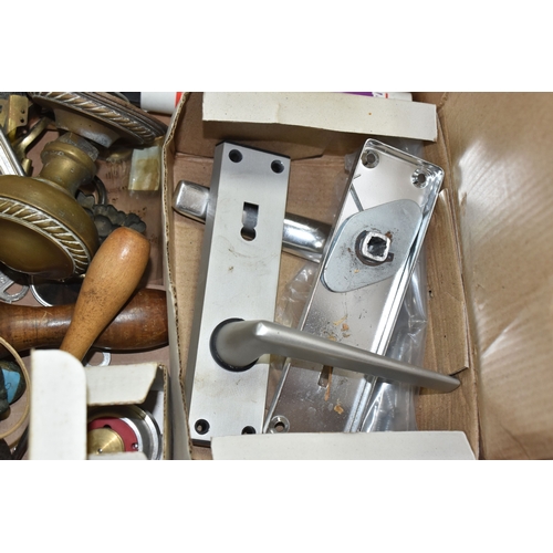 902 - A BOX OF DOOR FURNISHINGS ETC to include two vintage knockers to include a heavy metal hand clasping... 