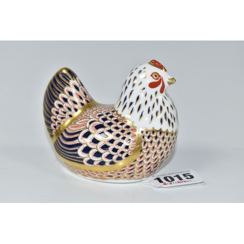1015 - A ROYAL CROWN DERBY 'HEN' PAPERWEIGHT, bearing gold stopper, but this is a second quality piece with... 