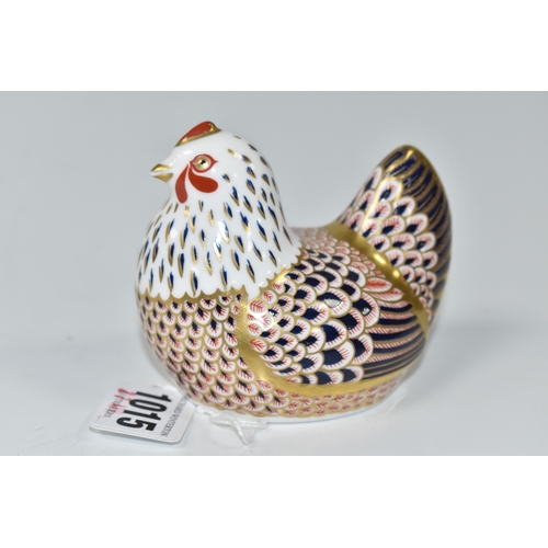 1015 - A ROYAL CROWN DERBY 'HEN' PAPERWEIGHT, bearing gold stopper, but this is a second quality piece with... 