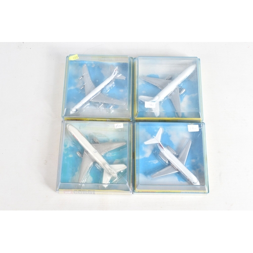 138 - FOUR BOXED MODEL AIRCRAFTS, to include a 1977 Corgi Avions 1325 Douglas DC-10 American Airlines plan... 