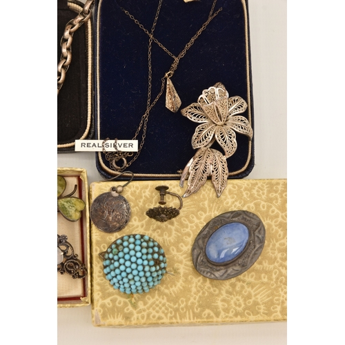 588 - AN ASSORTMENT OF JEWELLERY, to include a white metal turquoise bombe brooch, unmarked, a white metal... 