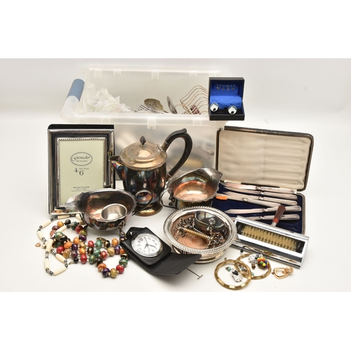 607 - A PLASTIC BOX OF ASSORTED WHITE METAL WARE, to include two EPNS sauce boats, a teapot, silver plated... 