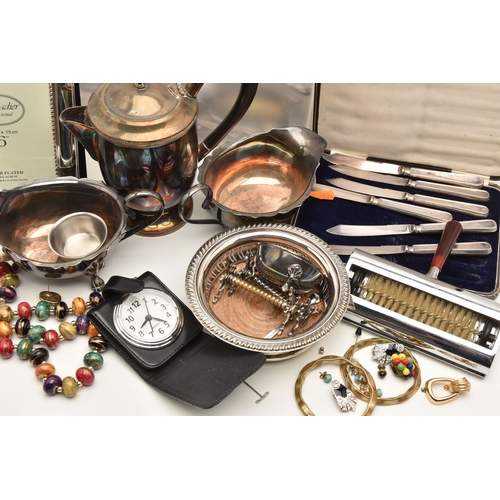 607 - A PLASTIC BOX OF ASSORTED WHITE METAL WARE, to include two EPNS sauce boats, a teapot, silver plated... 