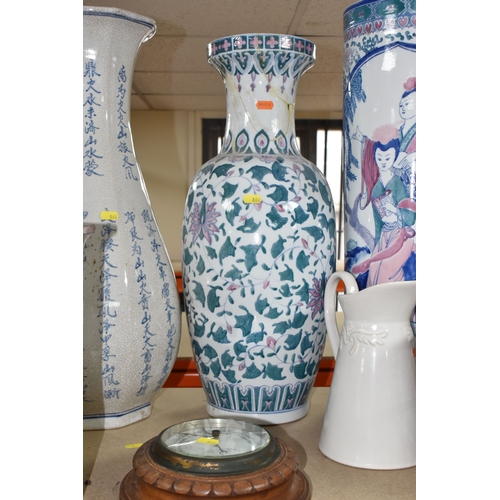 864 - A GROUP OF LARGE CERAMIC VASES AND AN OIL LAMP, to include three large modern vases, largest being a... 