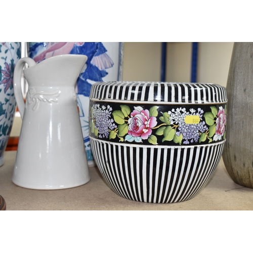 864 - A GROUP OF LARGE CERAMIC VASES AND AN OIL LAMP, to include three large modern vases, largest being a... 