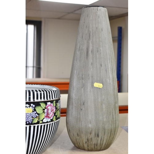 864 - A GROUP OF LARGE CERAMIC VASES AND AN OIL LAMP, to include three large modern vases, largest being a... 