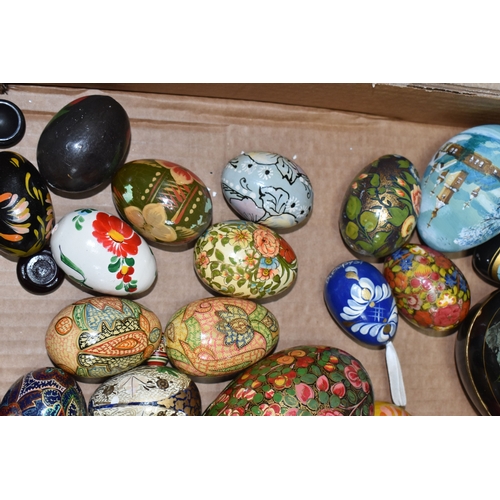 891 - TWO BOXES OF DECORATIVE EGG ORNAMENTS to include five decorated with Orthodox Christian motifs, a la... 
