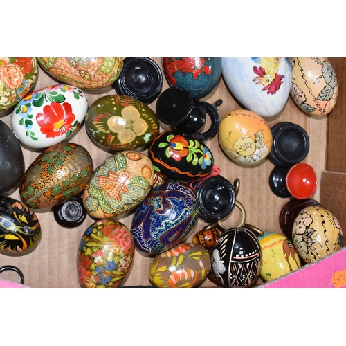 891 - TWO BOXES OF DECORATIVE EGG ORNAMENTS to include five decorated with Orthodox Christian motifs, a la... 