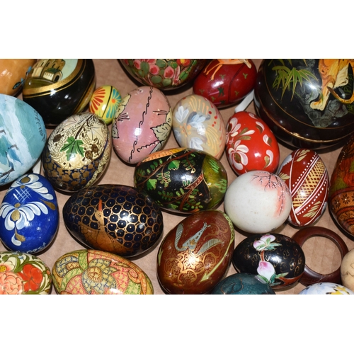 891 - TWO BOXES OF DECORATIVE EGG ORNAMENTS to include five decorated with Orthodox Christian motifs, a la... 