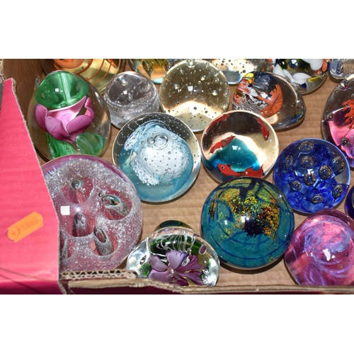 A BOX OF PAPERWEIGHTS comprising approximately forty examples to ...