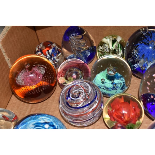 A BOX OF PAPERWEIGHTS comprising approximately forty examples to ...