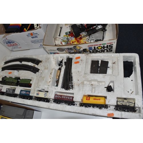 947 - THREE BOXES AND LOOSE REMOTE CONTROL CARS AND TRAINS to include a Kyosho 1:10 scale off road racing ... 