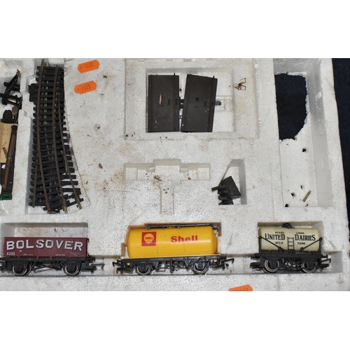 947 - THREE BOXES AND LOOSE REMOTE CONTROL CARS AND TRAINS to include a Kyosho 1:10 scale off road racing ... 