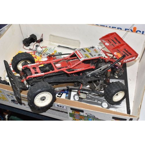947 - THREE BOXES AND LOOSE REMOTE CONTROL CARS AND TRAINS to include a Kyosho 1:10 scale off road racing ... 
