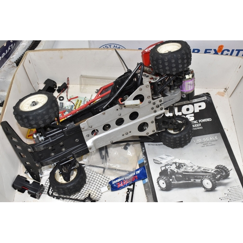 947 - THREE BOXES AND LOOSE REMOTE CONTROL CARS AND TRAINS to include a Kyosho 1:10 scale off road racing ... 