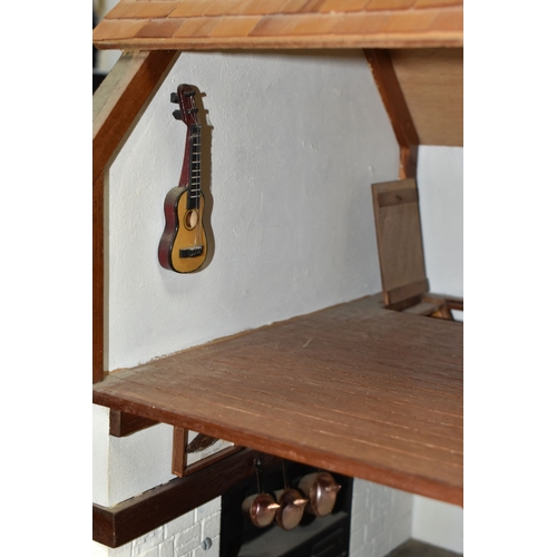 949 - THREE BOXES AND LOOSE DOLLS HOUSE AND ACCESSORIES comprising a large dolls house in the form of a ha... 