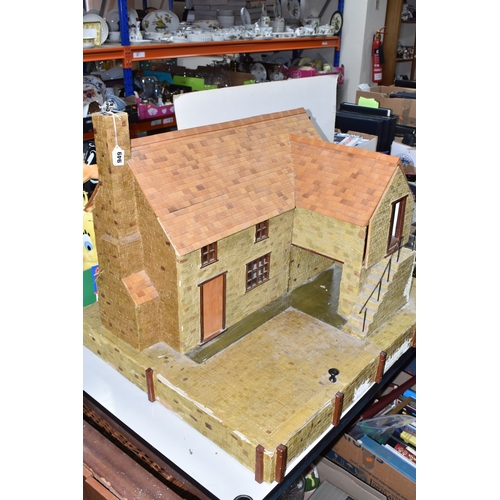 949 - THREE BOXES AND LOOSE DOLLS HOUSE AND ACCESSORIES comprising a large dolls house in the form of a ha... 