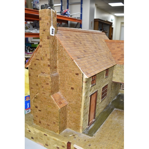 949 - THREE BOXES AND LOOSE DOLLS HOUSE AND ACCESSORIES comprising a large dolls house in the form of a ha... 