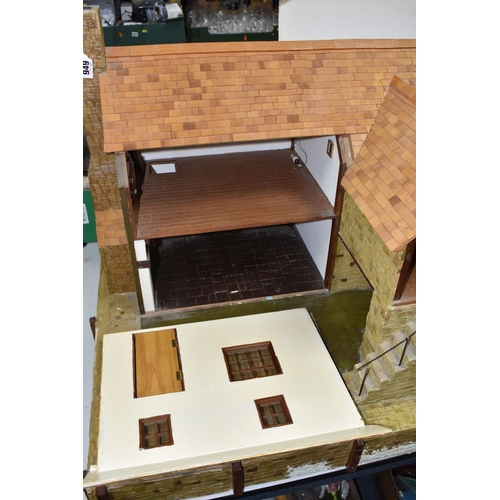 949 - THREE BOXES AND LOOSE DOLLS HOUSE AND ACCESSORIES comprising a large dolls house in the form of a ha... 