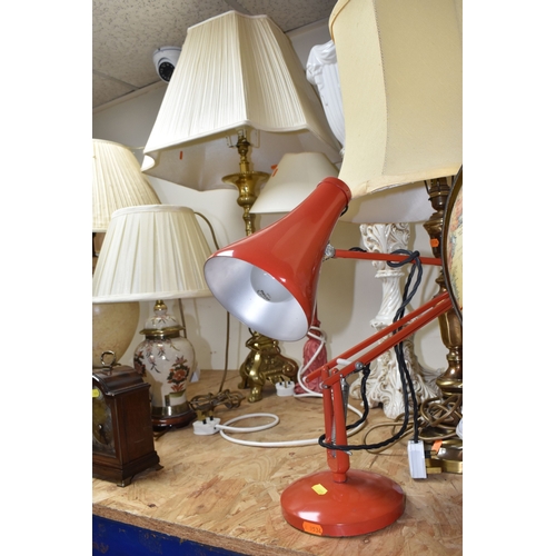 951 - A LARGE GROUP OF LAMPS AND CLOCKS, to include a tall brass lamp with shade approximately 100cm tall,... 
