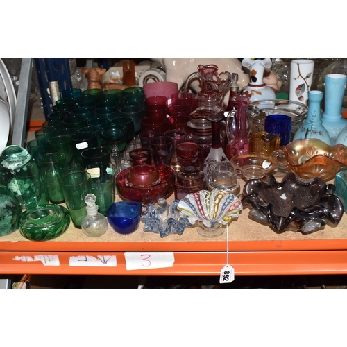 892 - A COLLECTION OF COLOURED GLASSWARE comprising two 19th century green dump paperweights (damage prese... 
