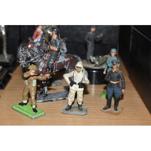 799 - A GROUP OF METAL VINTAGE SOLDIER FIGURES, comprising sixteen miniature silver plated Royal Hampshire... 