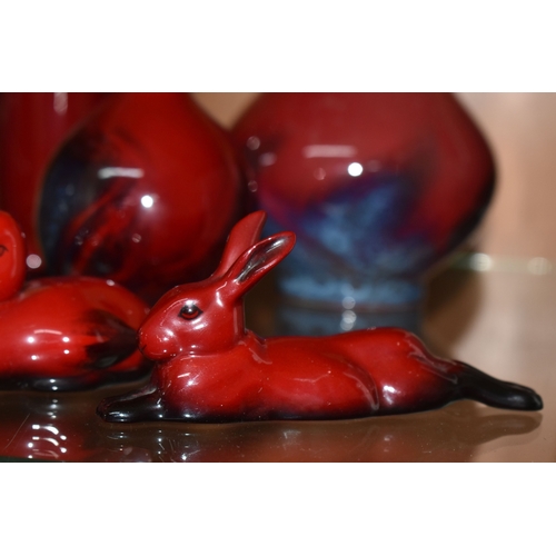 807 - A GROUP OF ROYAL DOULTON FLAMBE VASES AND FIGURES, comprising figures of a penguin, height 15.5cm (s... 
