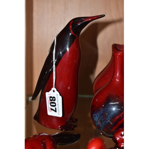807 - A GROUP OF ROYAL DOULTON FLAMBE VASES AND FIGURES, comprising figures of a penguin, height 15.5cm (s... 