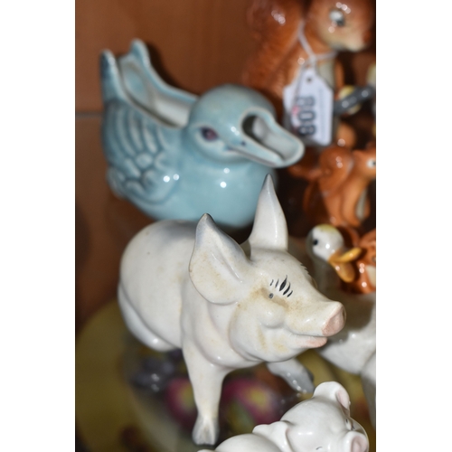 808 - A GROUP OF BESWICK ANIMALS, comprising three Squirrels model no 1007, no 1008 and no 1009, four Rabb... 