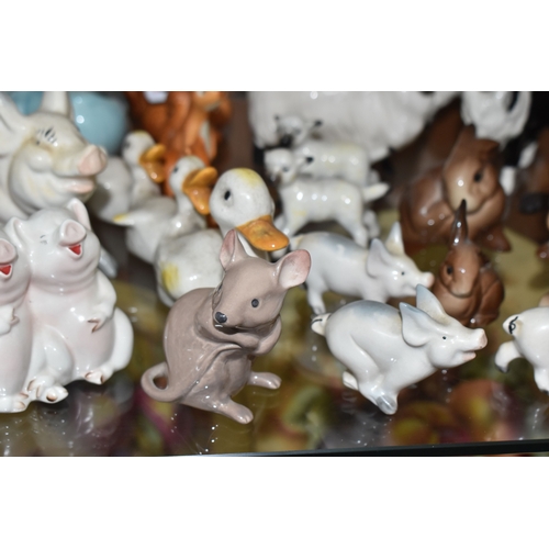 808 - A GROUP OF BESWICK ANIMALS, comprising three Squirrels model no 1007, no 1008 and no 1009, four Rabb... 