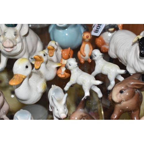 808 - A GROUP OF BESWICK ANIMALS, comprising three Squirrels model no 1007, no 1008 and no 1009, four Rabb... 