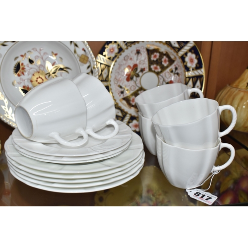 817 - TWENTY THREE PIECES OF ROYAL CROWN DERBY DINNER WARE, comprising six pieces of Asian Rose A962: thre... 
