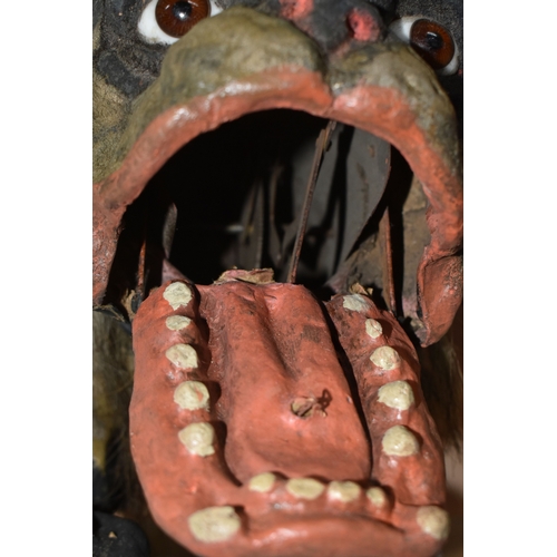 821 - A FRENCH BULLDOG 'GROWLER' TOY, circa 1890-1900, of flocked papier mache construction, with chain le... 