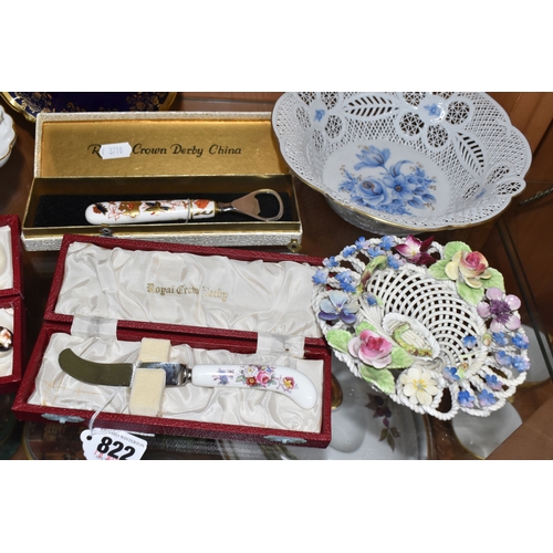822 - A GROUP OF CERAMICS, to include boxed Royal Crown Derby cheese knives and bottle opener, four Grapha... 