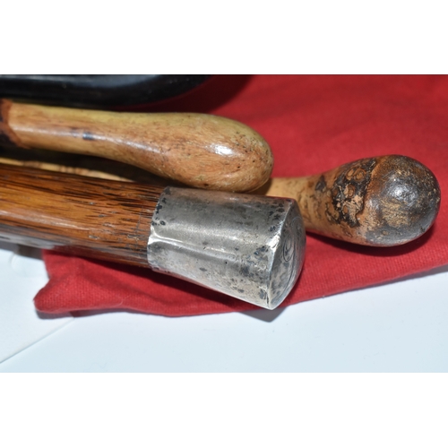 823 - A BOX AND LOOSE HANDBAGS AND WALKING STICKS, to include four walking sticks, including one with silv... 