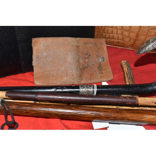 823 - A BOX AND LOOSE HANDBAGS AND WALKING STICKS, to include four walking sticks, including one with silv... 